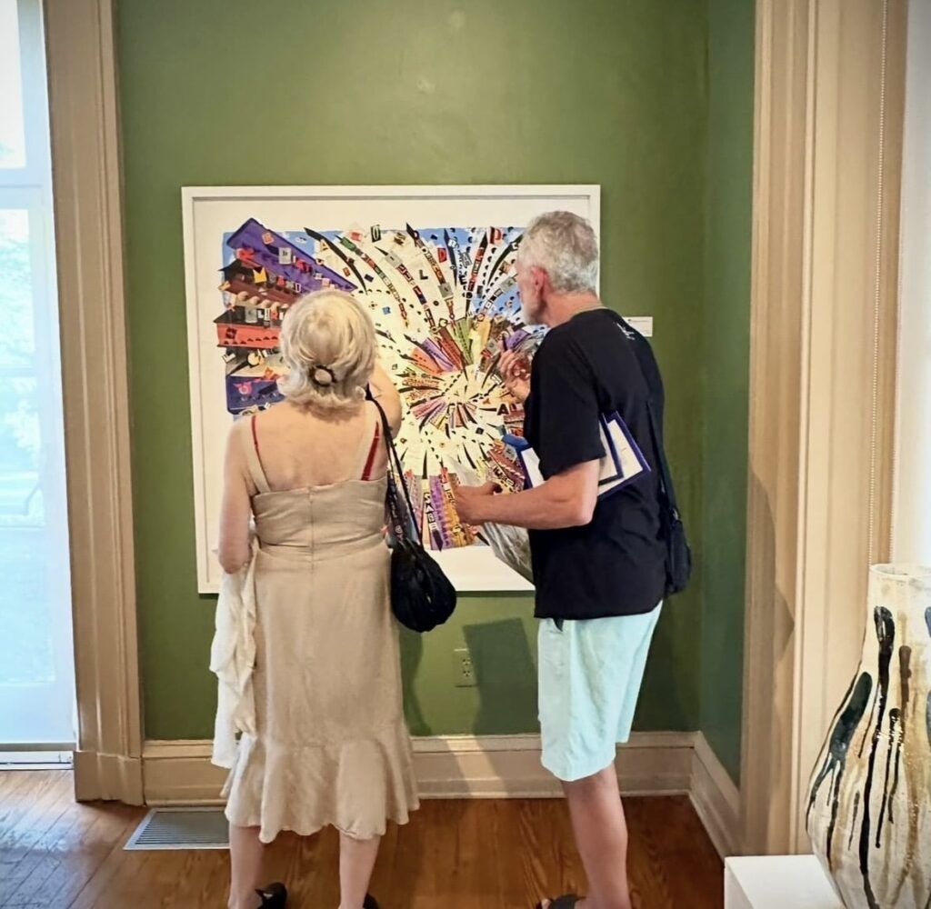 Guests viewing a collage at the Trenton City Museum.